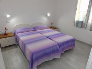 Ένα ή περισσότερα κρεβάτια σε δωμάτιο στο San Marco - Appartamenti