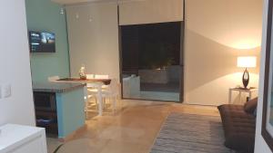TV a/nebo společenská místnost v ubytování Quetzal Apartment