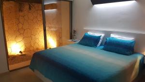Postel nebo postele na pokoji v ubytování Quetzal Apartment