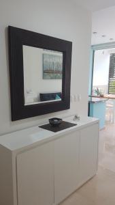 TV a/nebo společenská místnost v ubytování Quetzal Apartment