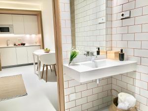 Кухня или мини-кухня в Inside Bilbao Apartments
