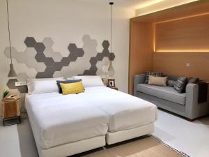 Кровать или кровати в номере Inside Bilbao Apartments