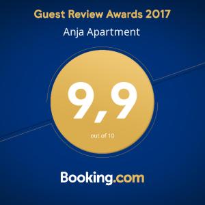 a yellow circle with the words guest review awards ataic appointment at anja apartment in Petrovac na Moru
