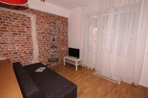 A television and/or entertainment centre at Largo Apartment