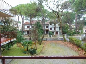 a view of a yard with trees and buildings at Mi.Ma's dream in Milano Marittima