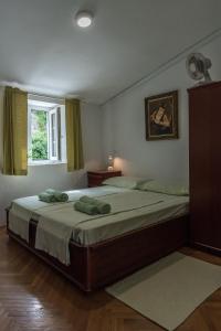 Posteľ alebo postele v izbe v ubytovaní Apartment Matijas