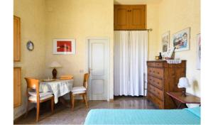 Postel nebo postele na pokoji v ubytování Camere e Appartamenti Baldini Romanita