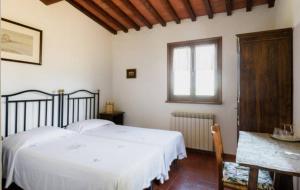 Postel nebo postele na pokoji v ubytování Camere e Appartamenti Baldini Romanita
