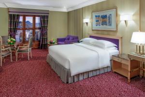 Postel nebo postele na pokoji v ubytování Makkah Hotel
