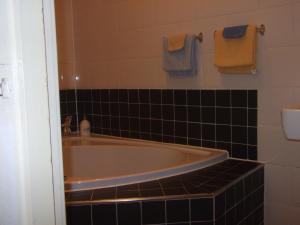 Een badkamer bij Hotel Hoogland Zandvoort aan Zee