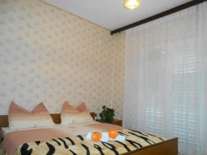 A bed or beds in a room at Apartment Andelka