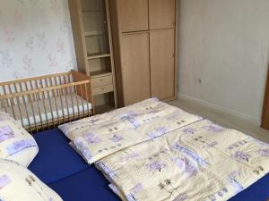 Postel nebo postele na pokoji v ubytování Ferienhaus Klinder