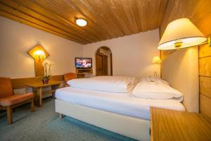 Una cama o camas en una habitación de Hotel Cresta