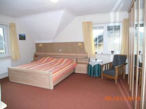 Postel nebo postele na pokoji v ubytování B&B De Boerderij