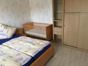Postel nebo postele na pokoji v ubytování Ferienhaus Klinder