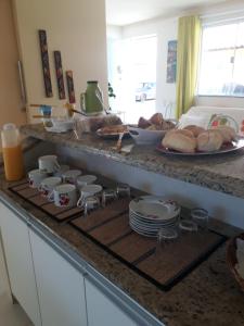 Dapur atau dapur kecil di Guest House Paraiso Pataxos