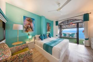 A bed or beds in a room at Hacienda Fisherman's Village Koh Samui