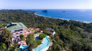 an aerial view of the resort and the beach at La Mariposa Apartments in Manuel Antonio