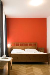 A bed or beds in a room at Ai Quattro Angeli