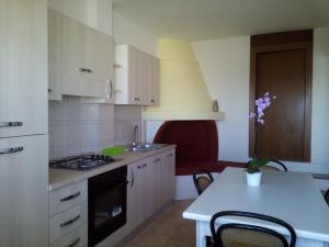A kitchen or kitchenette at Casa Vacanze Sergio