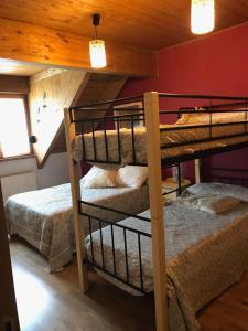 Poschodová posteľ alebo postele v izbe v ubytovaní El Rincon de Yolanda