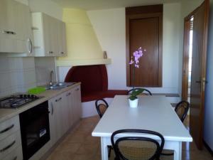 A kitchen or kitchenette at Casa Vacanze Sergio