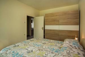 Postel nebo postele na pokoji v ubytování Apartment Ivica