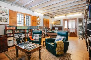 Ruang duduk di Vila Caelus masía boutique