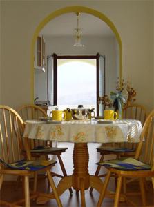 a table and chairs with a table and a mirror at Villa Ana in Pag +48 photos