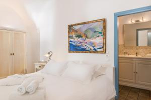 Voodi või voodid majutusasutuse Pantelia Suites toas