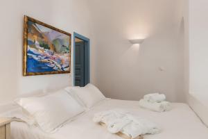 Voodi või voodid majutusasutuse Pantelia Suites toas