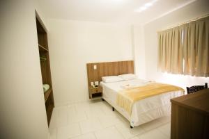 Cama ou camas em um quarto em Hotel Folley