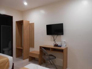 TV a/nebo společenská místnost v ubytování Rublin Hotel Cebu
