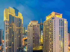 a view of a city skyline with tall buildings at Shangri-La Dalian in Dalian