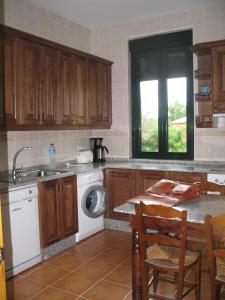 A kitchen or kitchenette at Dama del Alba
