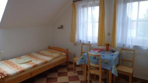 Posteľ alebo postele v izbe v ubytovaní Pension Camp Prager