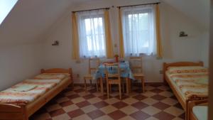 Posteľ alebo postele v izbe v ubytovaní Pension Camp Prager