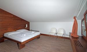Letto o letti in una camera di Hotel Adam