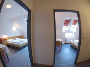 Postel nebo postele na pokoji v ubytování Haus Mobene - Hotel Garni