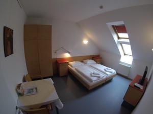 Postel nebo postele na pokoji v ubytování Haus Mobene - Hotel Garni