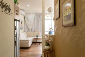 Ένα ή περισσότερα κρεβάτια σε δωμάτιο στο Sunset TLV Apartment - Ben Yehuda 175