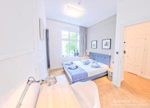 Posteľ alebo postele v izbe v ubytovaní Family Luxury Wonder Heaven Apartment, 50m to M Cassino, first with 3 badrooms&studio, second with 2 badrooms&studio, parking w cenie