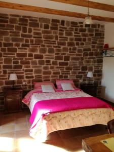 Uma cama ou camas num quarto em B&B PompeiLog