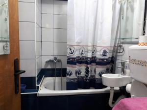 Koupelna v ubytování Apartment Adela