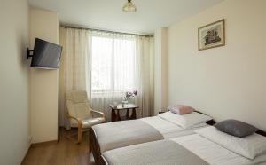 Posteľ alebo postele v izbe v ubytovaní Jawor + 26 fotografií