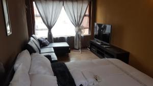 Et tv og/eller underholdning på Let Us accomodation