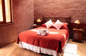 Ένα ή περισσότερα κρεβάτια σε δωμάτιο στο Hotel Kimal