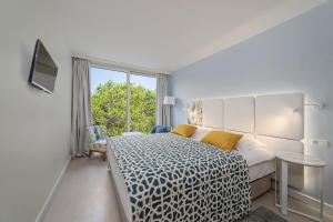 Postel nebo postele na pokoji v ubytování Amadria Park Family Hotel Jakov
