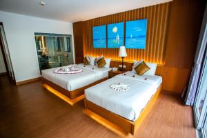 Ein Bett oder Betten in einem Zimmer der Unterkunft Phi Phi Harbour View Hotel-SHA Extra Plus