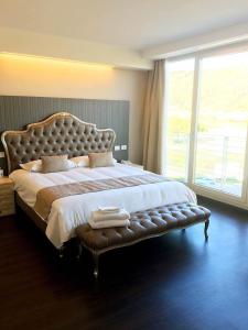 Letto o letti in una camera di Hotel Datini